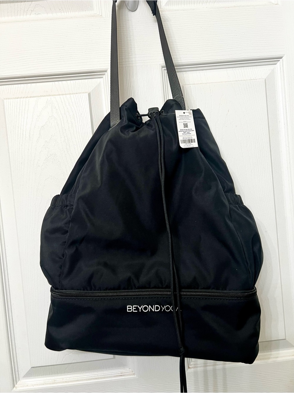Beyond Yoga Black Drawstring Backpack with Lower Zip Compartment